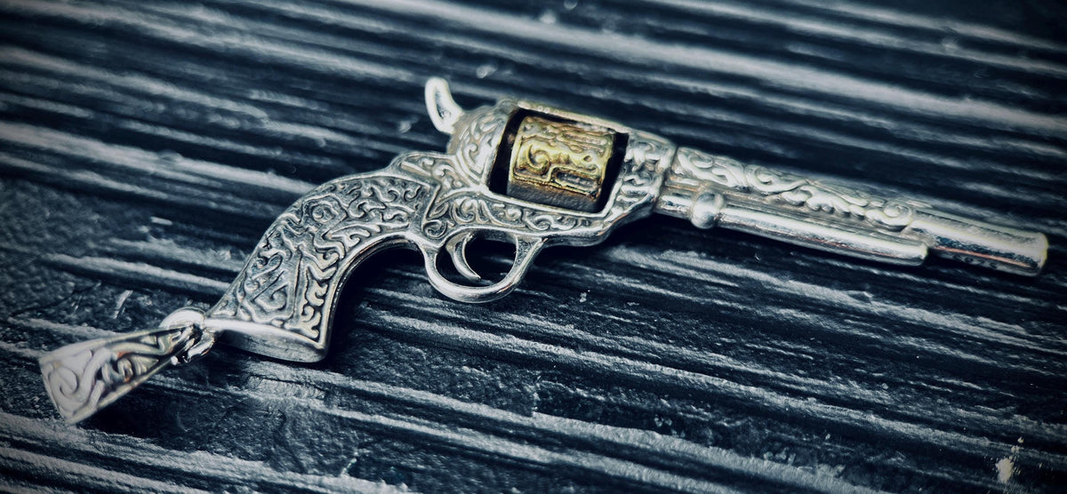 Ornate Engraved Stainless Steel Silver Outlaw Cowboy Revolver Gun Pendant with Gold Plated Cylinder