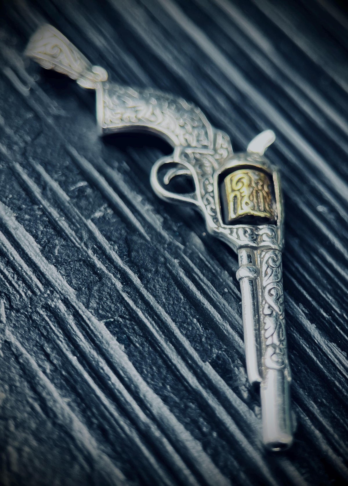 Ornate Engraved Stainless Steel Silver Outlaw Cowboy Revolver Gun Pendant with Gold Plated Cylinder